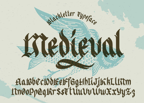 Gothic medieval typeface. Black-letter fracture font with flying fish illustration.
