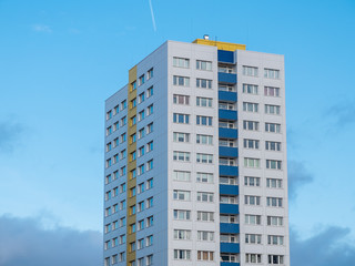 High Rise Apartment Building with Blue Balconies