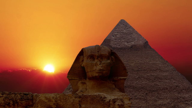 Sunrise over the pyramid of Cheops and Sphinx. Giza Egypt. (Time lapse. Animation. Montage)
