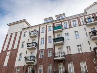 Naklejka premium Renovated Apartment Building with Small Balconies