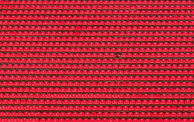 Empty tribunes of the stadium with one inverted seat