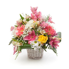 Fototapeta na wymiar Flowers arrangement in a basket