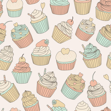 hand drawn vector seamless pattern with cupcakes
