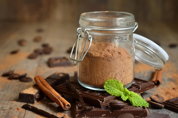 Cocoa powder in a glass jar.
