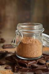Cocoa powder in a glass jar.