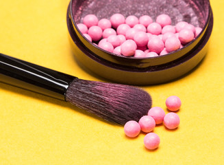 Makeup brush with shimmer blush balls