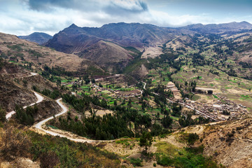 Fototapeta na wymiar road, village and mountains