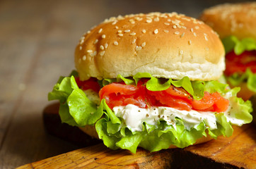Healthy burger with salted salmon and cream cheese.