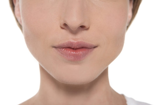Close-up on a half female face - isolated