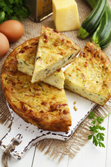 Zucchini pie with cheese and herbs