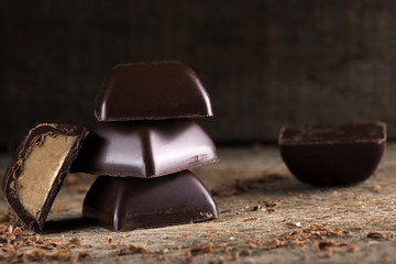 Chocolate pieces on wood
