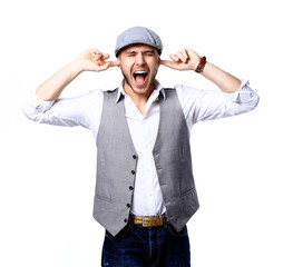 Portrait of young man with shocked facial expression, isolated over white background