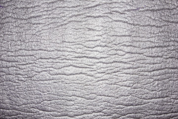 Reflecting light, crumpled wavy material texture.