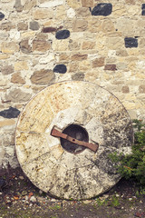 Old millstone for watermill