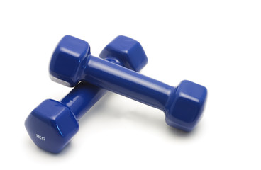 Two dumbbells on a white background
