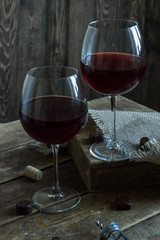Red wine glasses and chocolates 