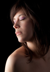 Close Up of Woman With Purple Eye Shadow