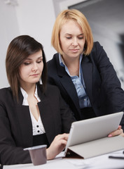 Two business woman in the office