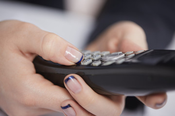 Obraz premium Radio phone in female hands