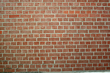 Fototapeta premium rote steinmauer lifestyle modern closeup kulisse konzept