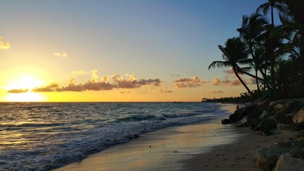 Beautiful sunrise over the tropical beach. Punta cana coastline, Dominican Republic