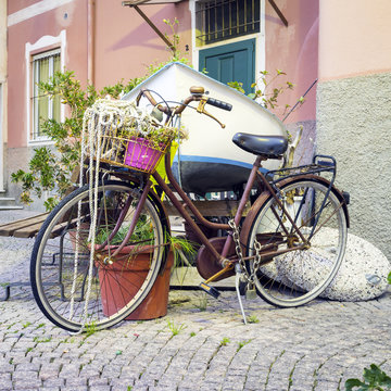 Old decorated bike. Color image