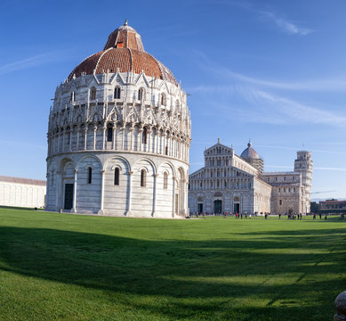 Baptistery, Cathedral and the Pisa Leaning tower in the famous Pisa's Cathedral Square, Square of Miracles (Piazza dei Miracoli) © goodcatfelix