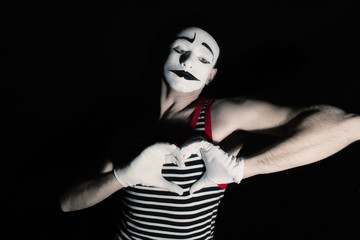 Sad mime with heart
