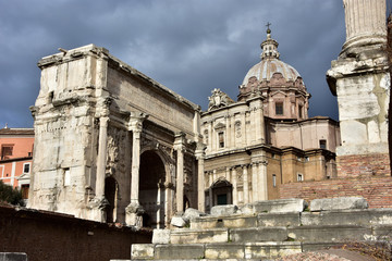 Arch of Septimius Severus with Saint Luca and Martina Church in Rome
