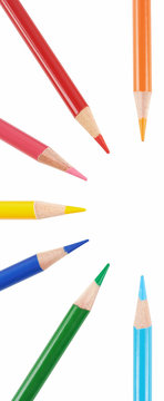 Colored pencils arranged in a circle. Objects  isolated on a white background without shadows.