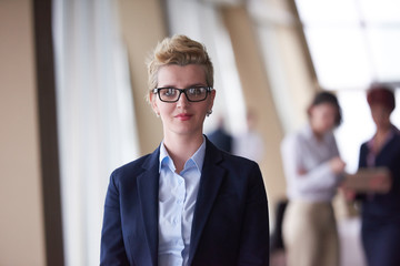 business people group, woman in front  as team leader