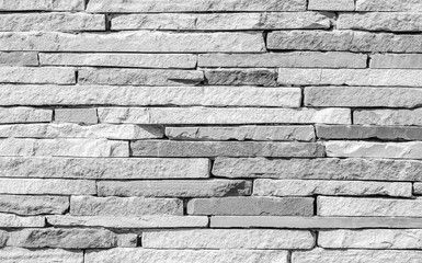 Surface wall of stone wall stones gray for use as background. The new design of modern stone wall. pattern of decorative stone wall surface.