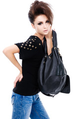 beautiful young woman holding a handbag