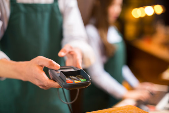 portrait waitress and waiter in cafe