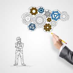 Businesswoman making sketches 