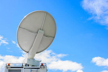 Satellite Dish on Mobile DSNG on Blue Sky