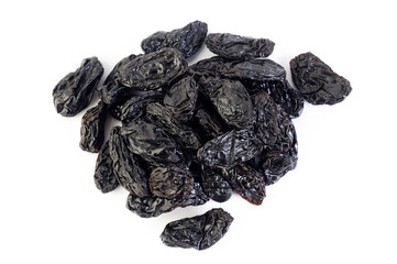 Dried raisins on white background