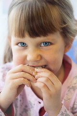 portrait, girl eating pastry