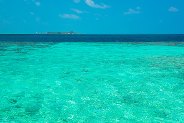 Sand beach and ocean wave, South Male Atoll. Maldives 