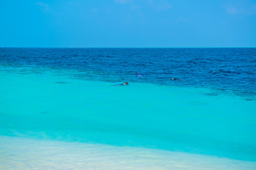 Sand beach and ocean wave, South Male Atoll. Maldives 