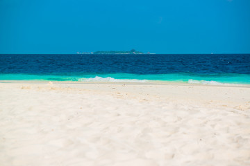 Fototapeta na wymiar Sand beach and ocean wave, South Male Atoll. Maldives 