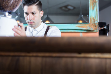 Bartender working in bar