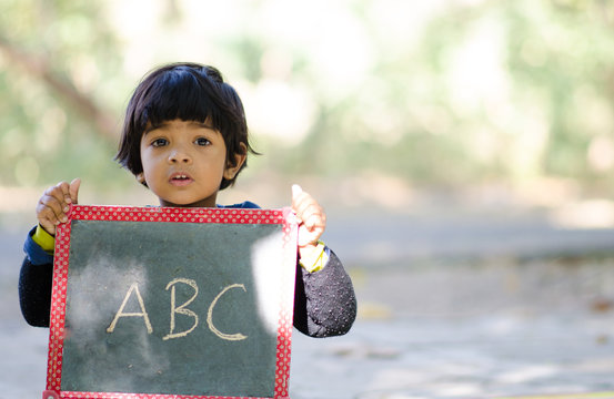 Indian Child Learning Abc Alphabets