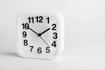 Office clock, isolated on white.