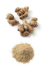 Fresh kencur roots and ground kencur powder