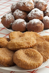 Heap of sugared fried fritters called oliebollen and appelflapp
