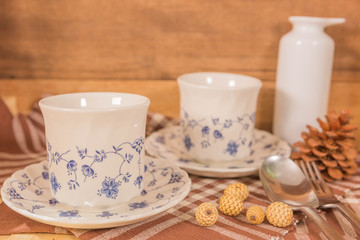 Vintage Filter : Tea Cup Set on wood background