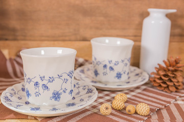 Vintage Filter : Tea Cup Set on wood background