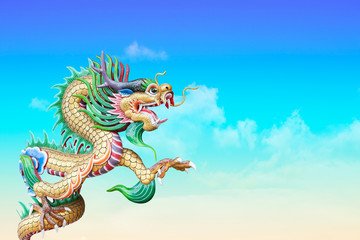 colorful Chinese dragon statue on sky and cloud background,with