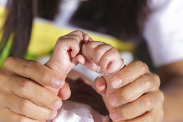 Hands of newborn baby
